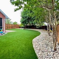 Backyard-Play-Haven-Kid-Friendly-Turf-River-Rock-Installation-in-Frisco-TX 5