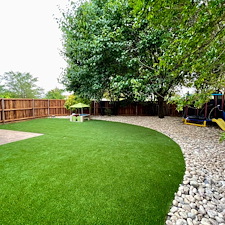 Backyard-Play-Haven-Kid-Friendly-Turf-River-Rock-Installation-in-Frisco-TX 6