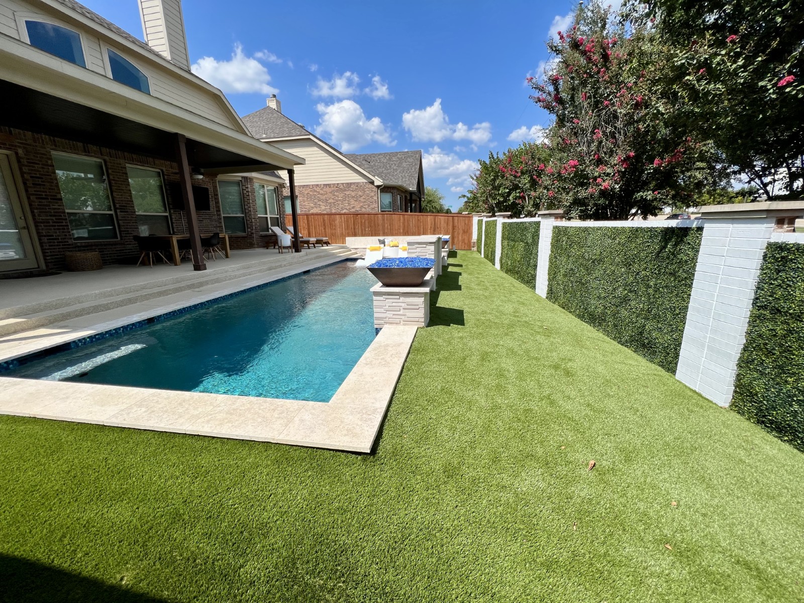 Luxury Backyard Oasis: Artificial Turf & Boxwood Ivy Upgrade in Hickory Creek, TX